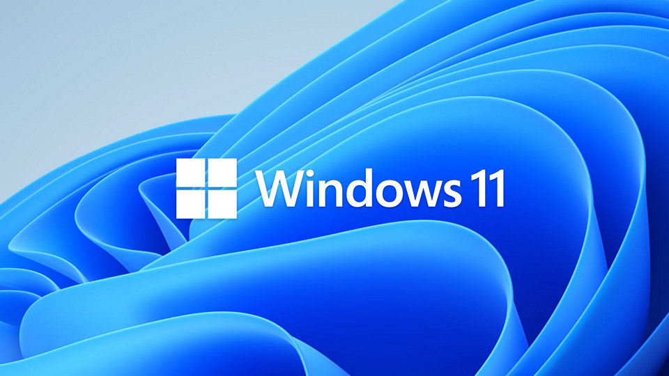 A picture showing the Windows-11 logo with blue swirls.
